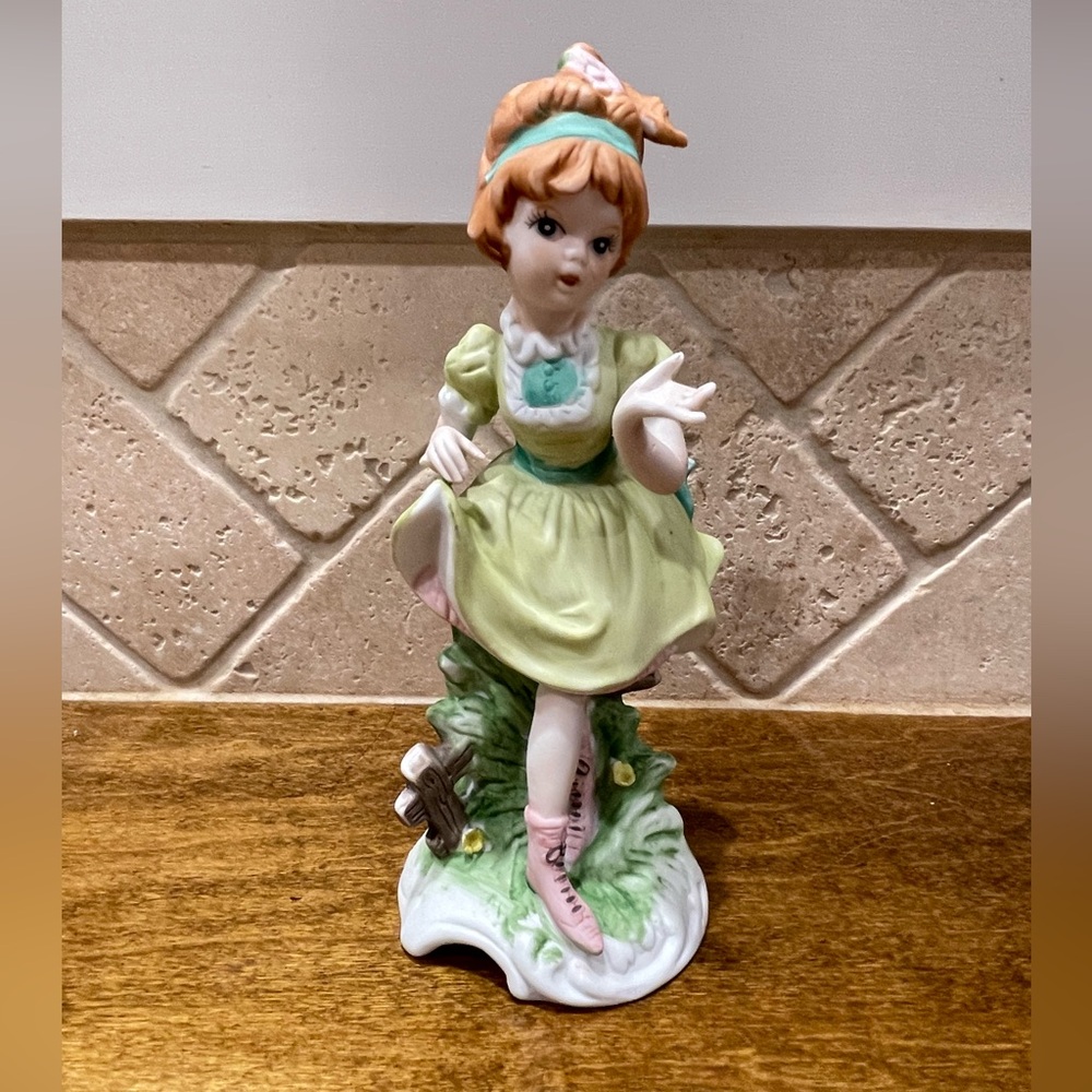 Vintage Ceramic Girl Figurine in Green Dress